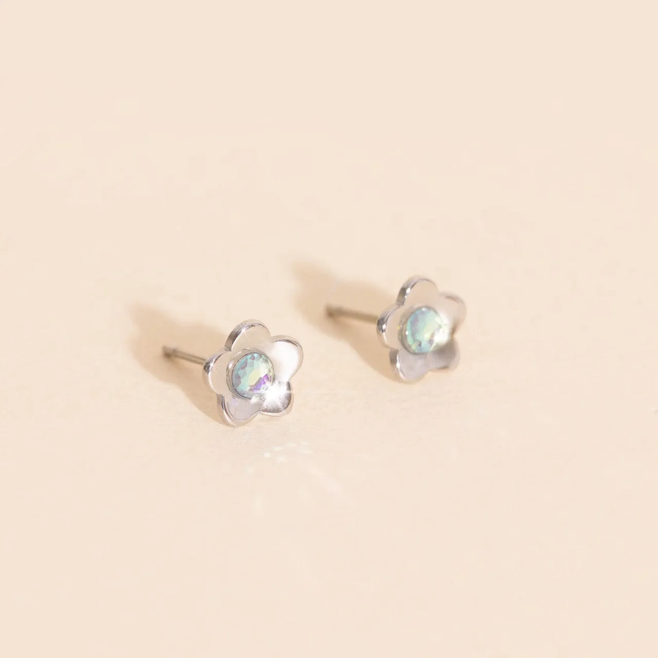 Mini Iridescent Flower Studs sold by Modcloth