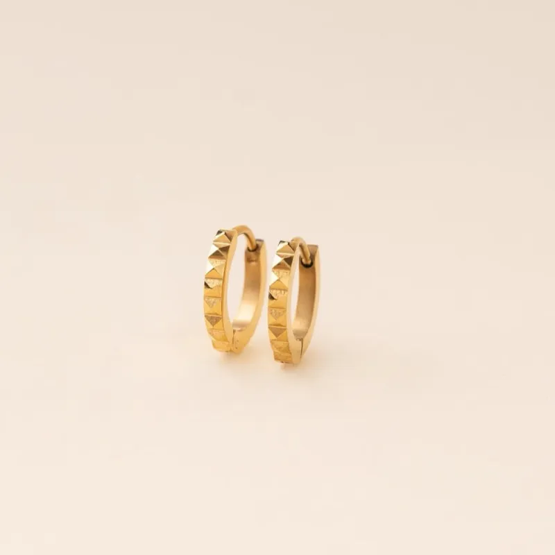 Studded Huggie Hoop Earrings made by Modcloth