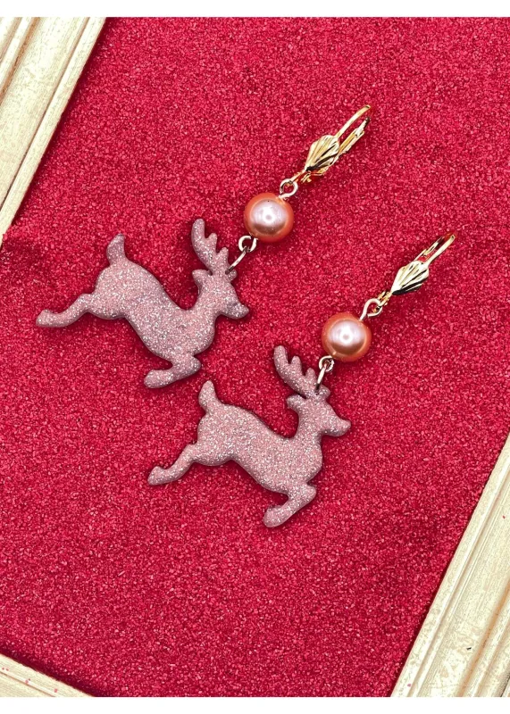 Holiday Rose Gold Reindeer Earrings sold by Modcloth