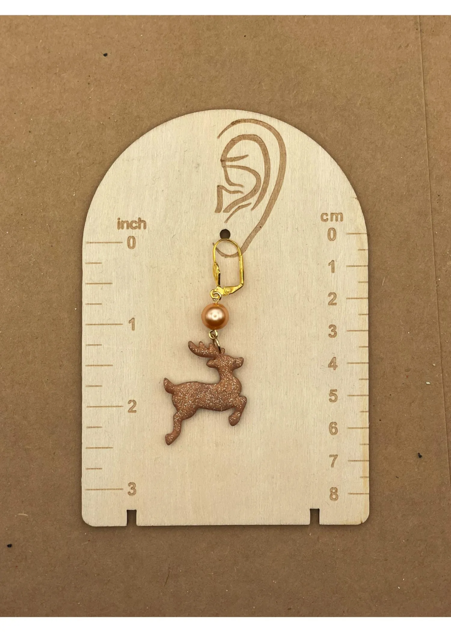 Holiday Rose Gold Reindeer Earrings sold by Modcloth product image thumbnail 2