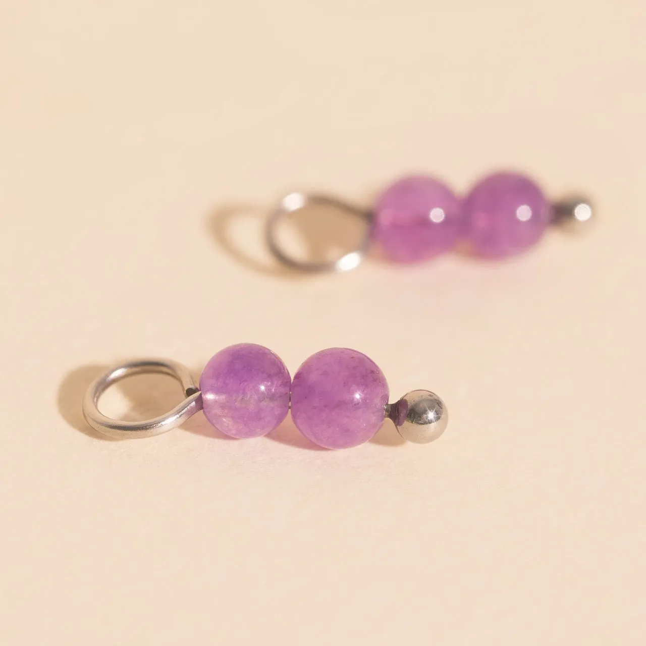 Lavender Bead Drop Huggie Hoop Charms sold by Modcloth