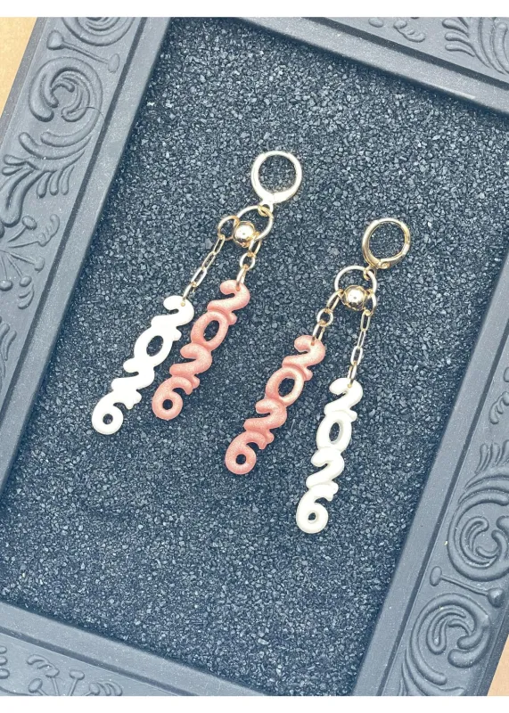 Jump Into 2026 Sparkly Rose Gold Earrings sold by Modcloth