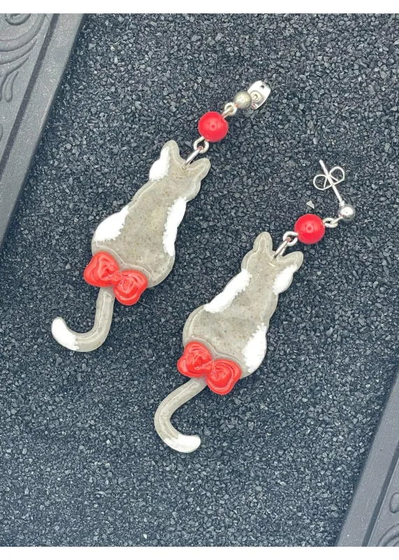 Grey Kitty Cat with Red Bow Earrings sold by Modcloth