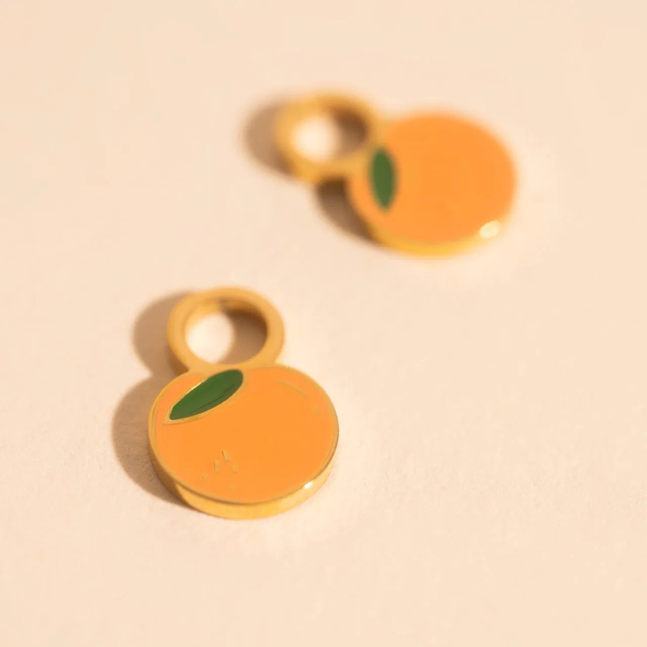 Mini Peach Huggie Hoop Charms sold by Modcloth