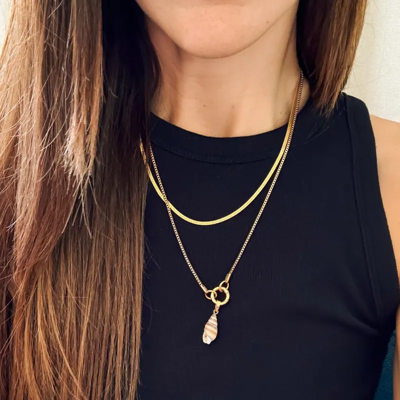 Spiral Shell Necklace Charm sold by Modcloth