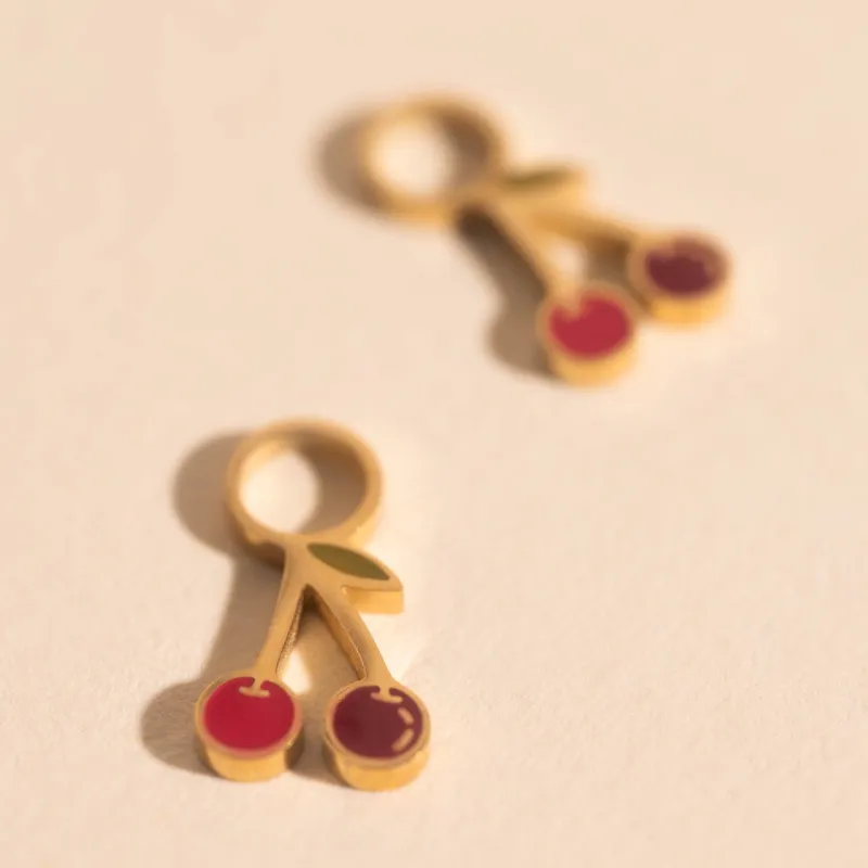 Mini Cherry Huggie Hoop Charms sold by Modcloth