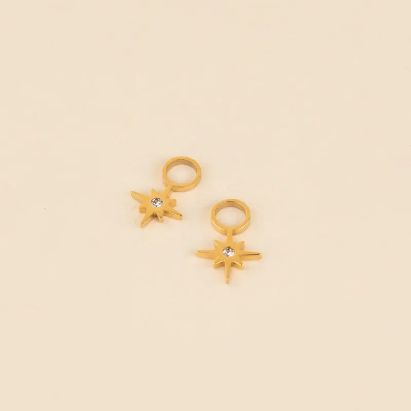 Mini Starburst Huggie Hoop Charms sold by Modcloth