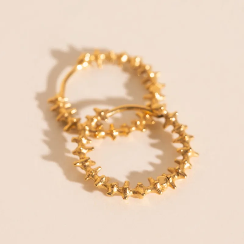 Spiky Huggie Hoop Earrings sold by Modcloth