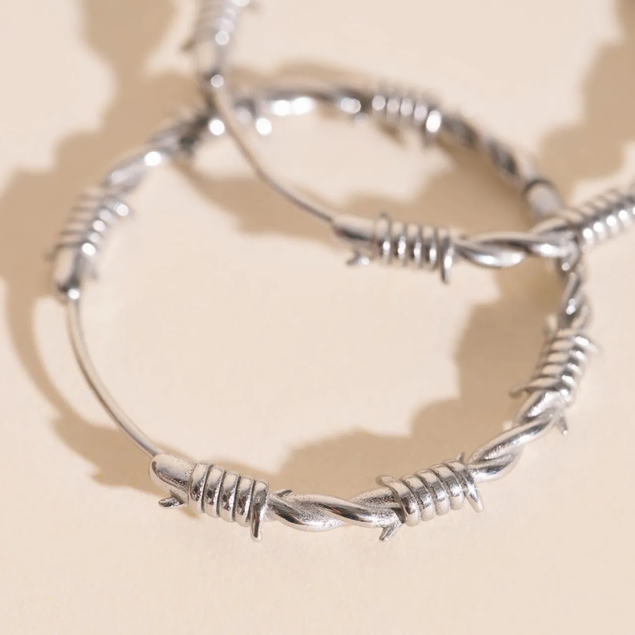 Barbed Wire Huggie Hoop Earrings sold by Modcloth product image thumbnail 3