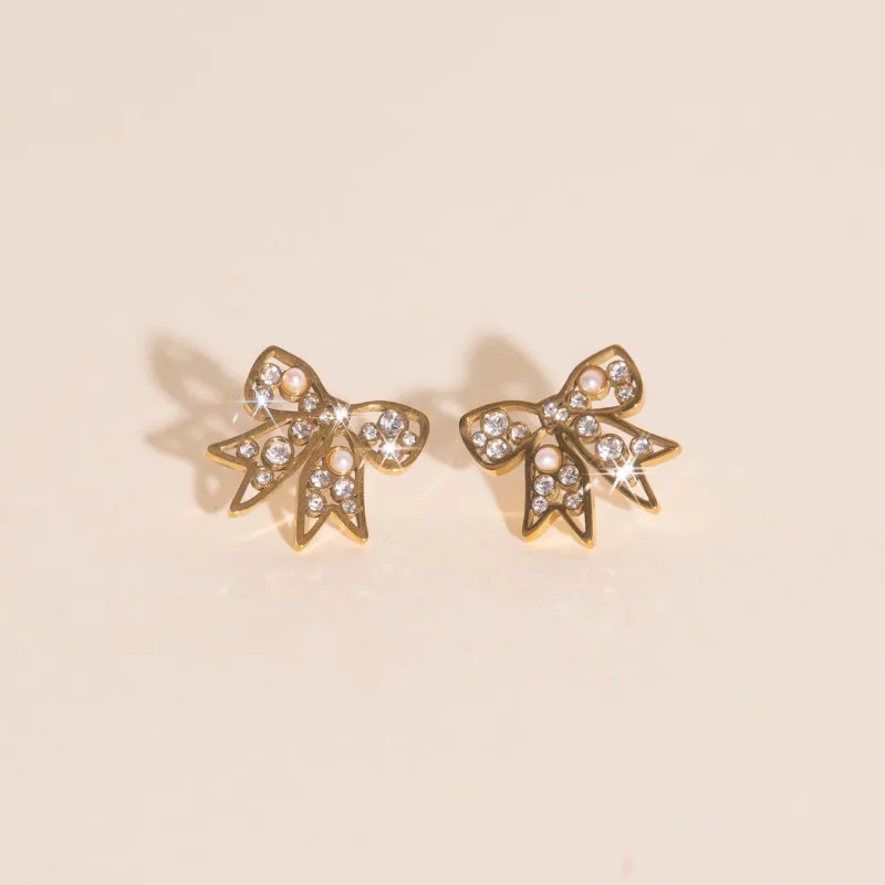 Luxe Ribbon Bow Stud Earrings sold by Modcloth