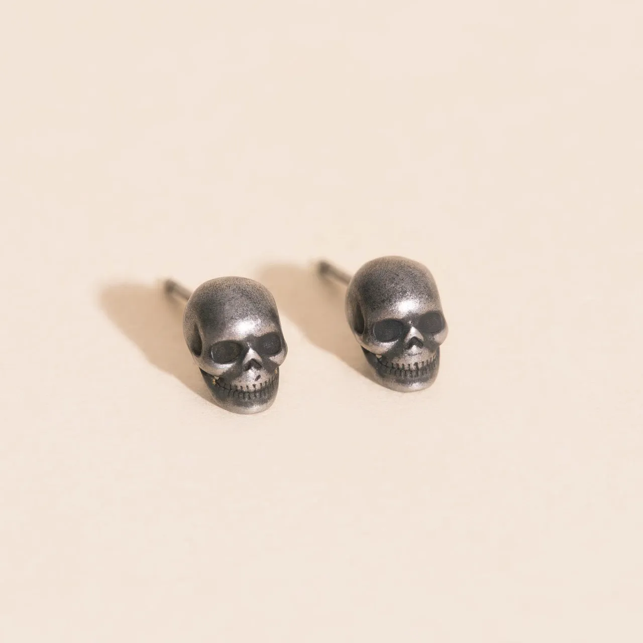Skull Stud Earrings sold by Modcloth