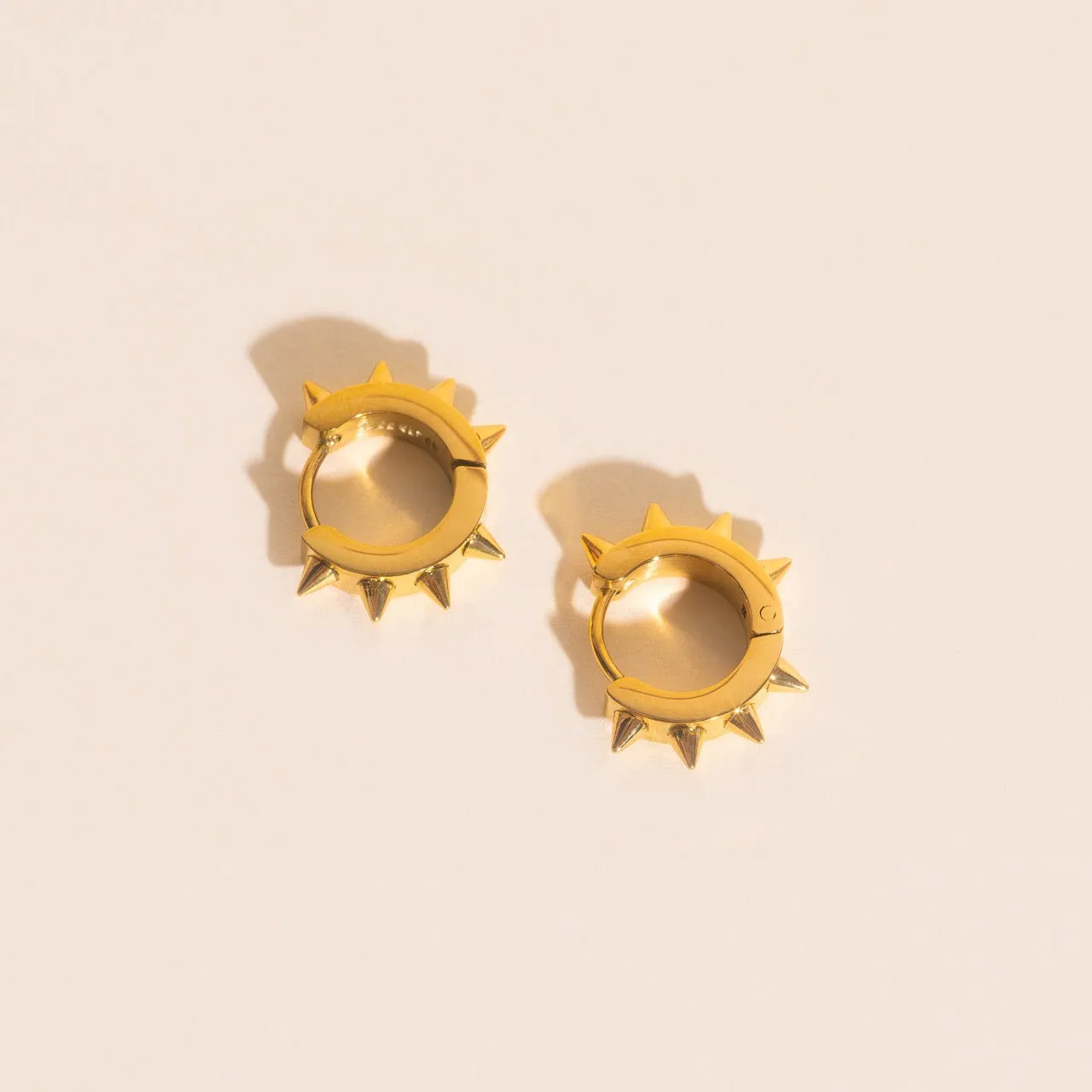 Spiked Chunky Huggie Hoop Earrings sold by Modcloth product image thumbnail 3