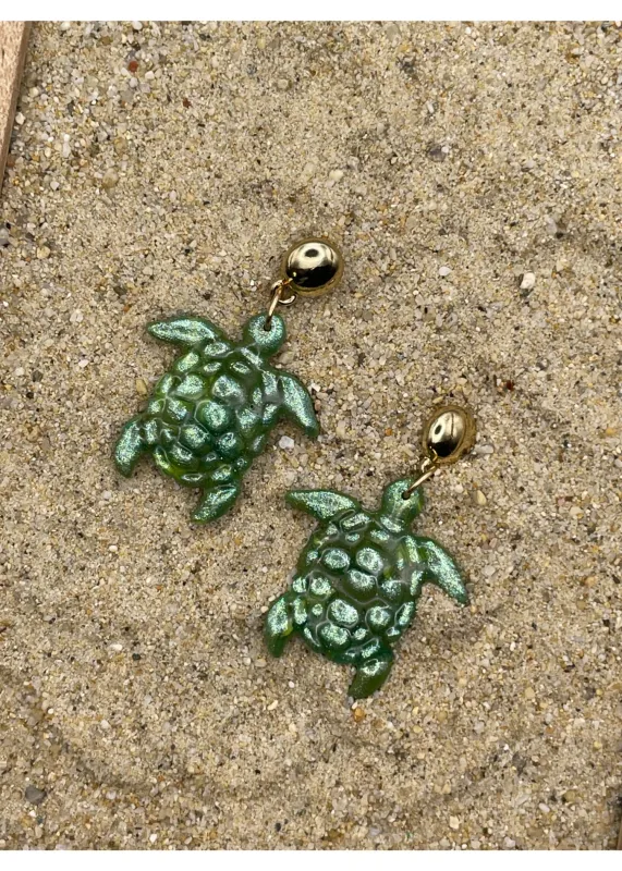 Cutie Turtle Shimmer Earrings sold by Modcloth