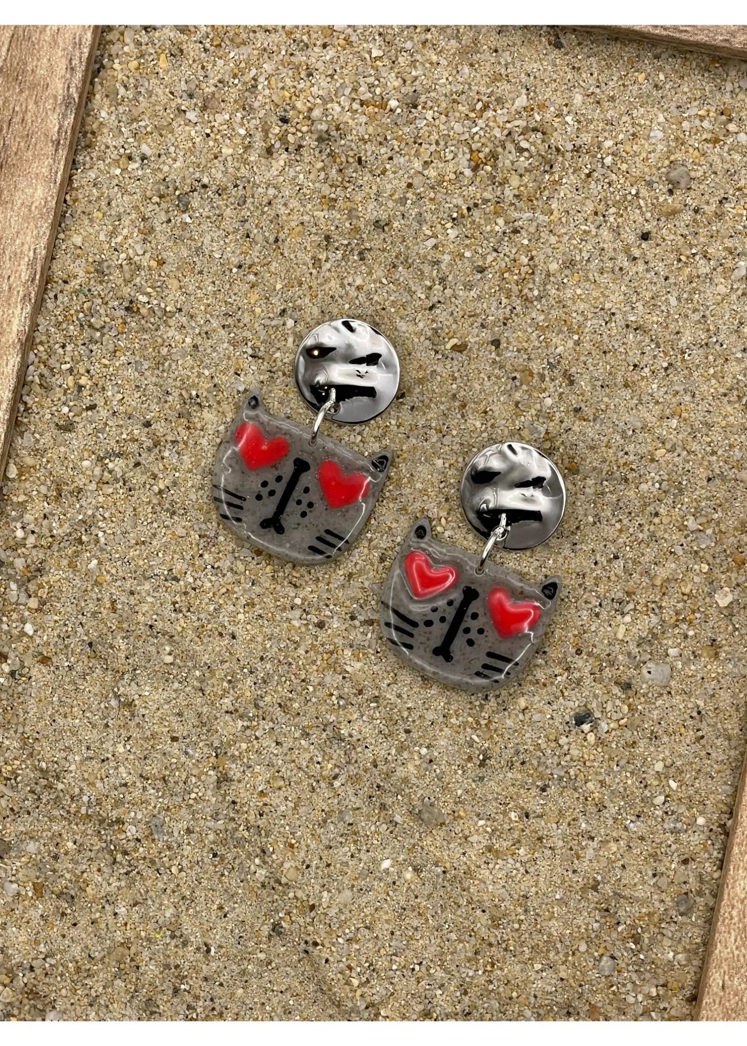 Heart Eyes Cat Face Earrings sold by Modcloth