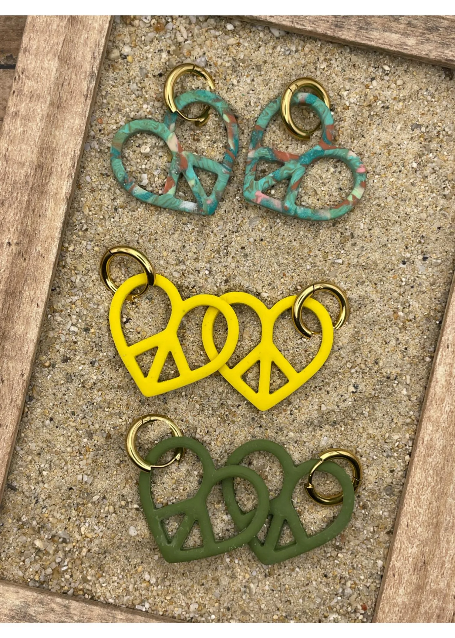 Peace Heart Dangly Hoop Earrings sold by Modcloth