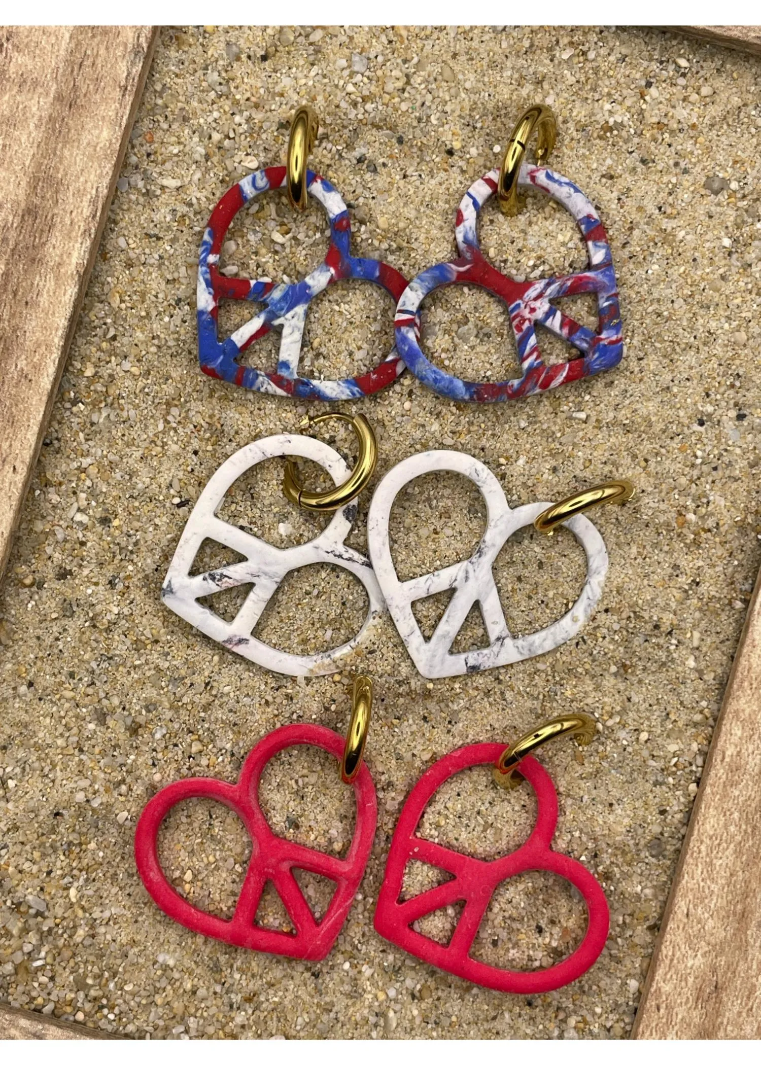 Peace Heart Dangly Hoop Earrings sold by Modcloth