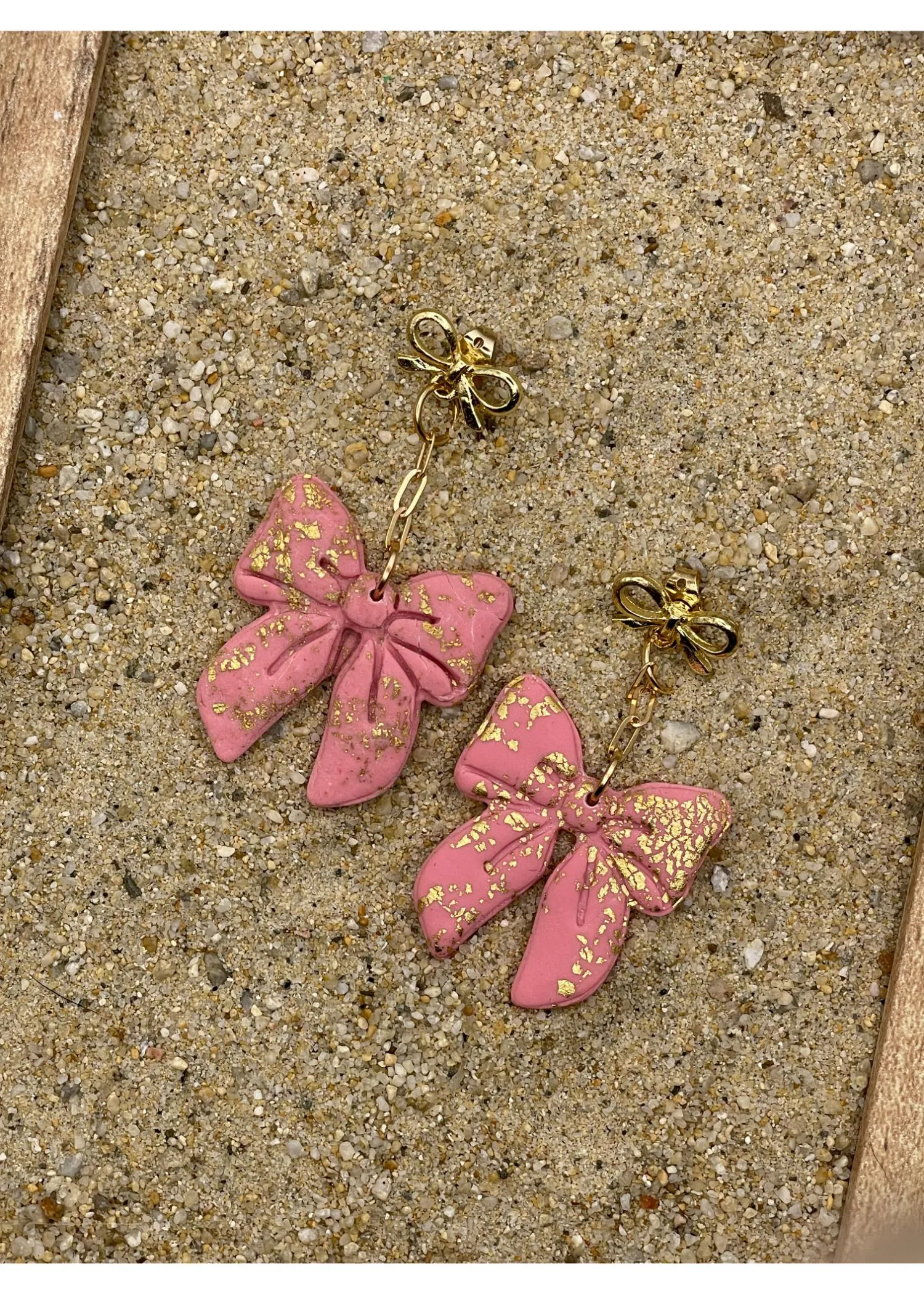 Pink Sparkle Bow Earrings with Gold Studs sold by Modcloth