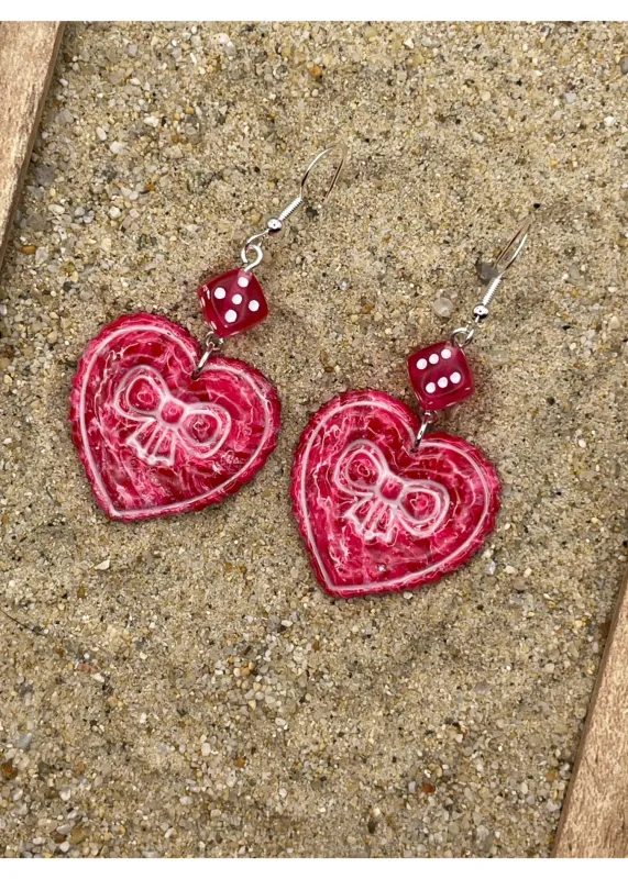 Dice Heart Earrings with Bow Imprint sold by Modcloth