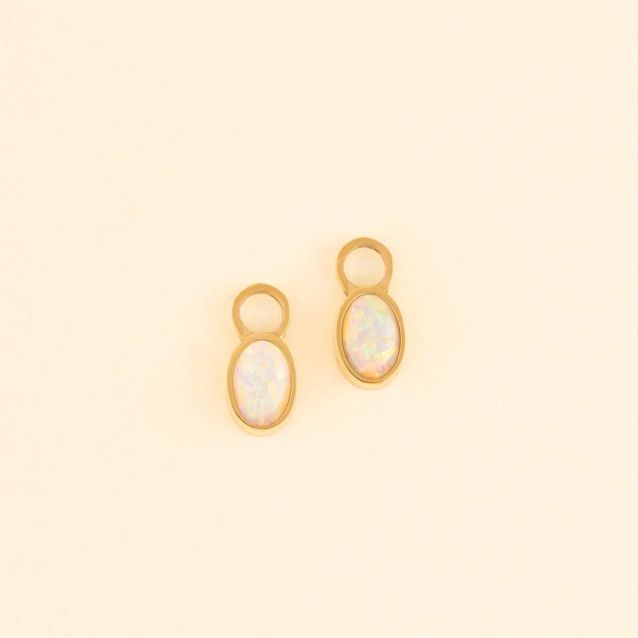 Opal Huggie Hoop Charms sold by Modcloth