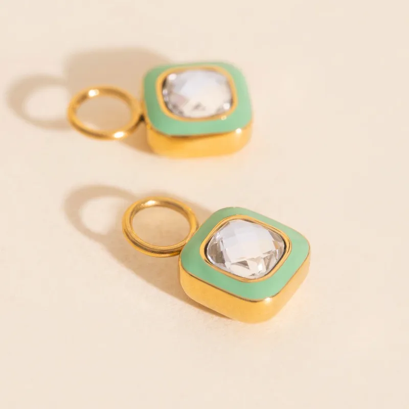 Showgirl Chunky Huggie Hoop Charm sold by Modcloth