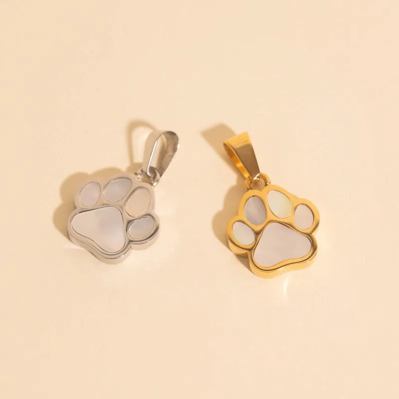 Paw Print Necklace Charm sold by Modcloth