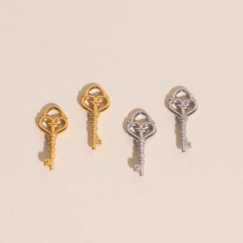 Key Heart Huggie Hoop Charms sold by Modcloth