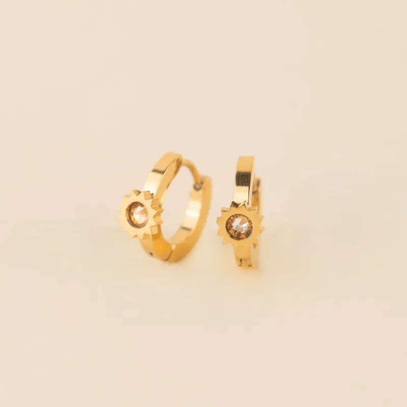 Sun 3D Huggie Hoop Earrings sold by Modcloth