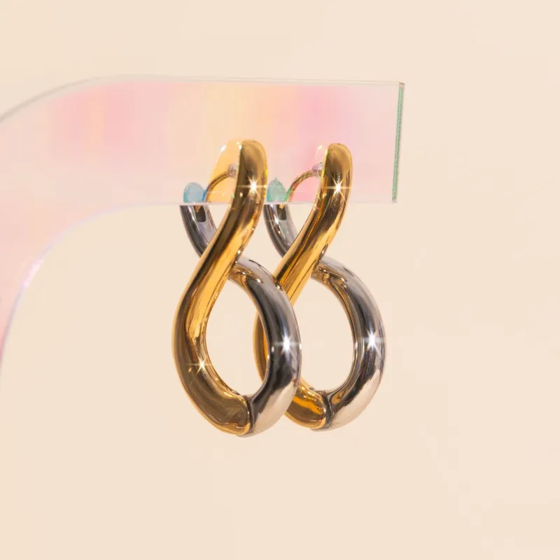 Infinity Chunky Rounded Huggie Hoop sold by Modcloth