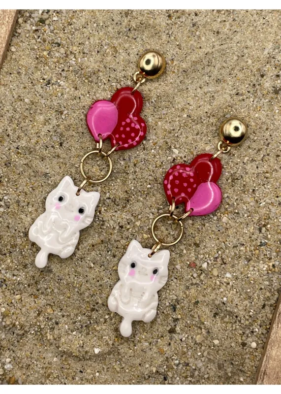 Kitty Cat Hanging from Balloons Earrings sold by Modcloth