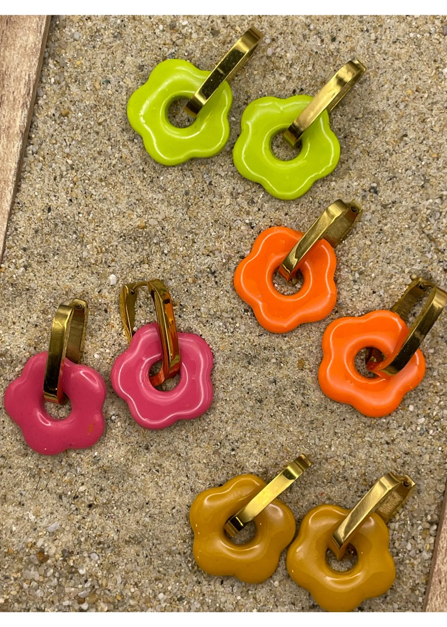 Mod Flower Huggie Hoop Earrings sold by Modcloth