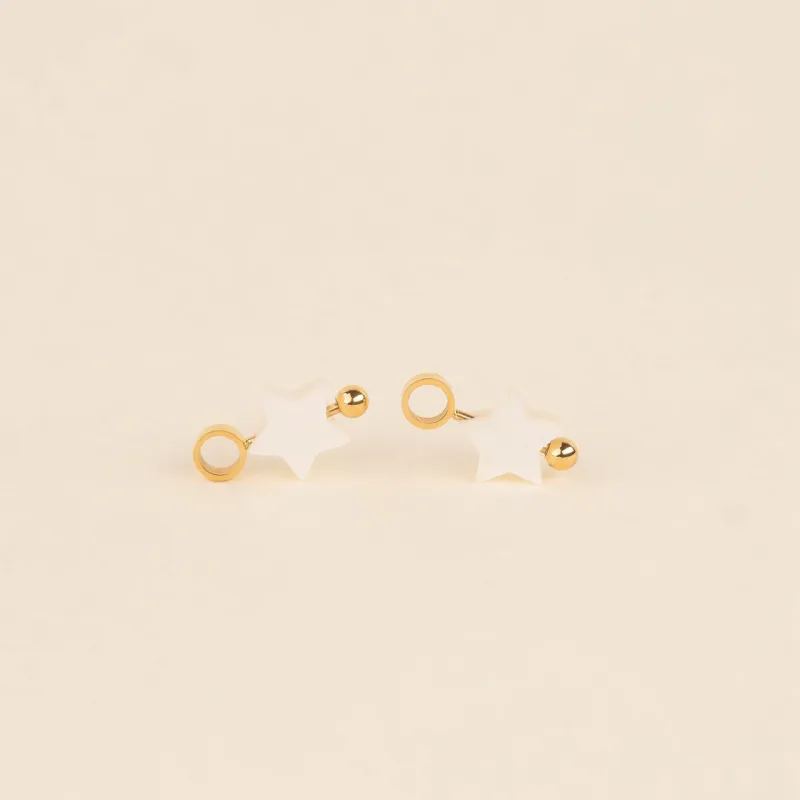 Iridescent Bead Star Huggie Hoop Charms sold by Modcloth