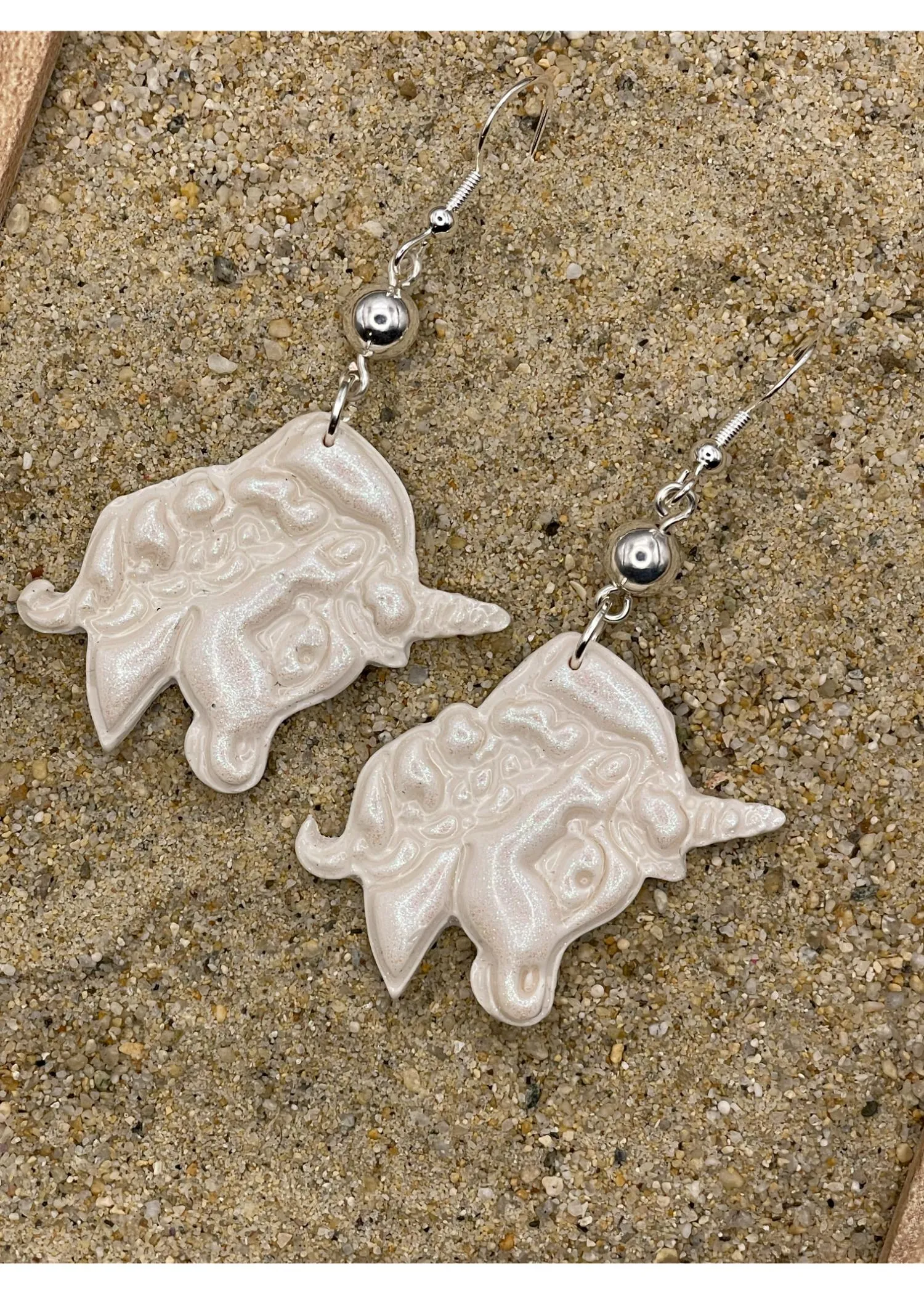 Unicorn Face Dangle Earrings - White sold by Modcloth