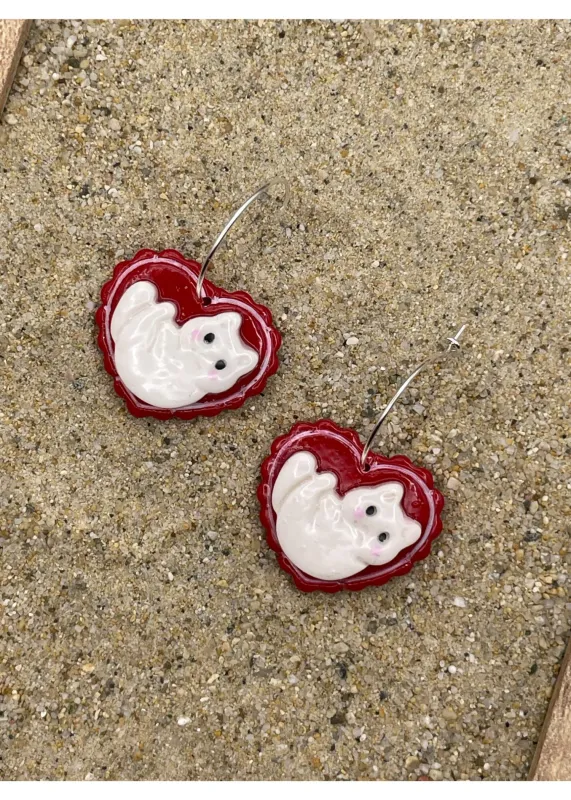 Love Crazy Purring Kitty Cat Heart Hoop Earrings sold by Modcloth