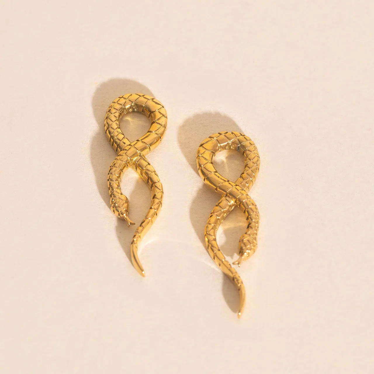 Snake Chunky Huggie Hoop Charms sold by Modcloth