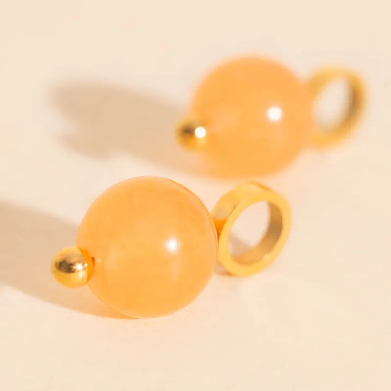 Aura Huggie Hoop Charms sold by Modcloth