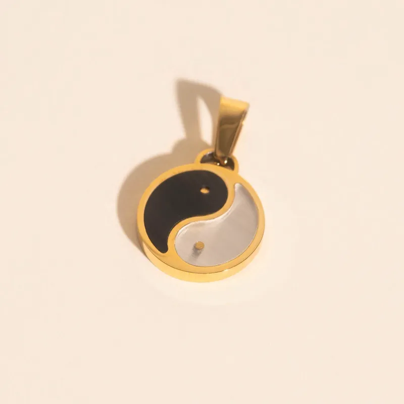 Yin & Yang Necklace Charm sold by Modcloth