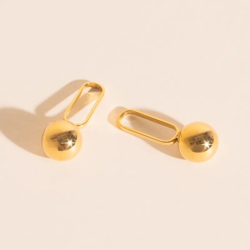 Ball Drop Chunky Huggie Hoop Charms sold by Modcloth