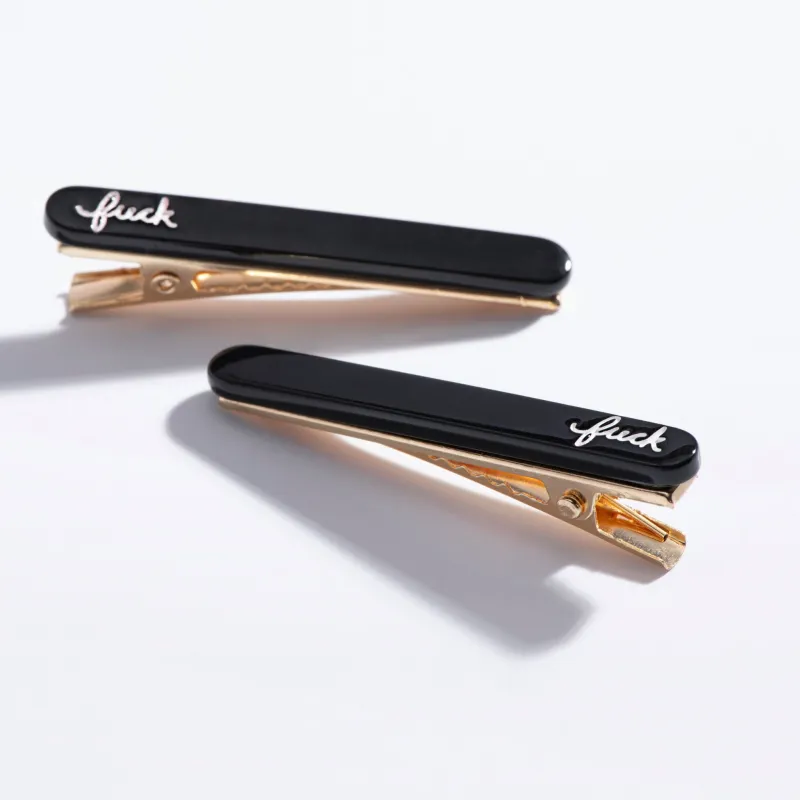 Fuck Script Hair Clips made by Modcloth