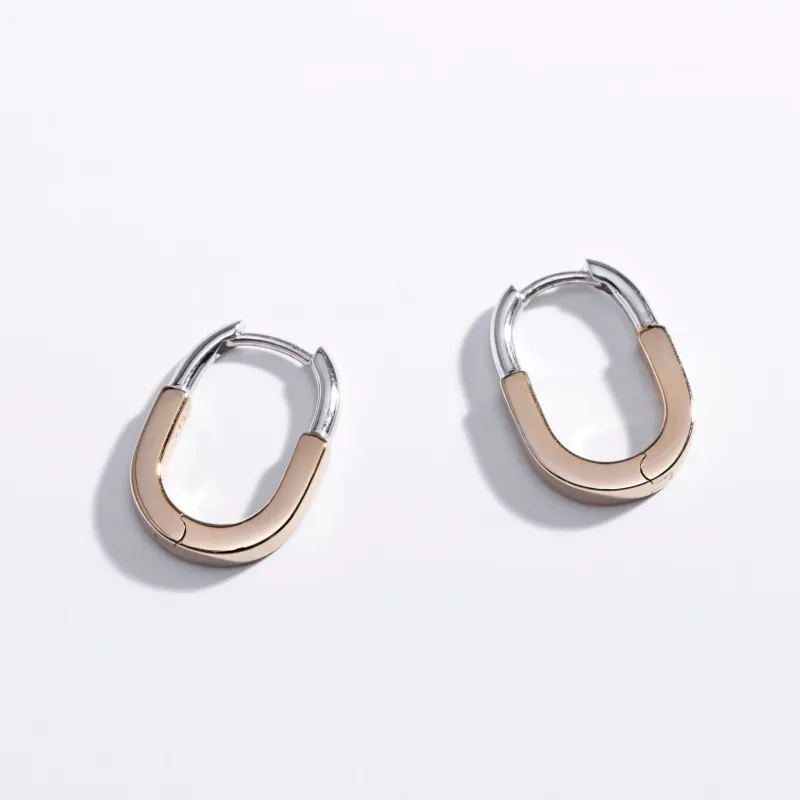 Mixed Metal Huggie Hoops sold by Modcloth