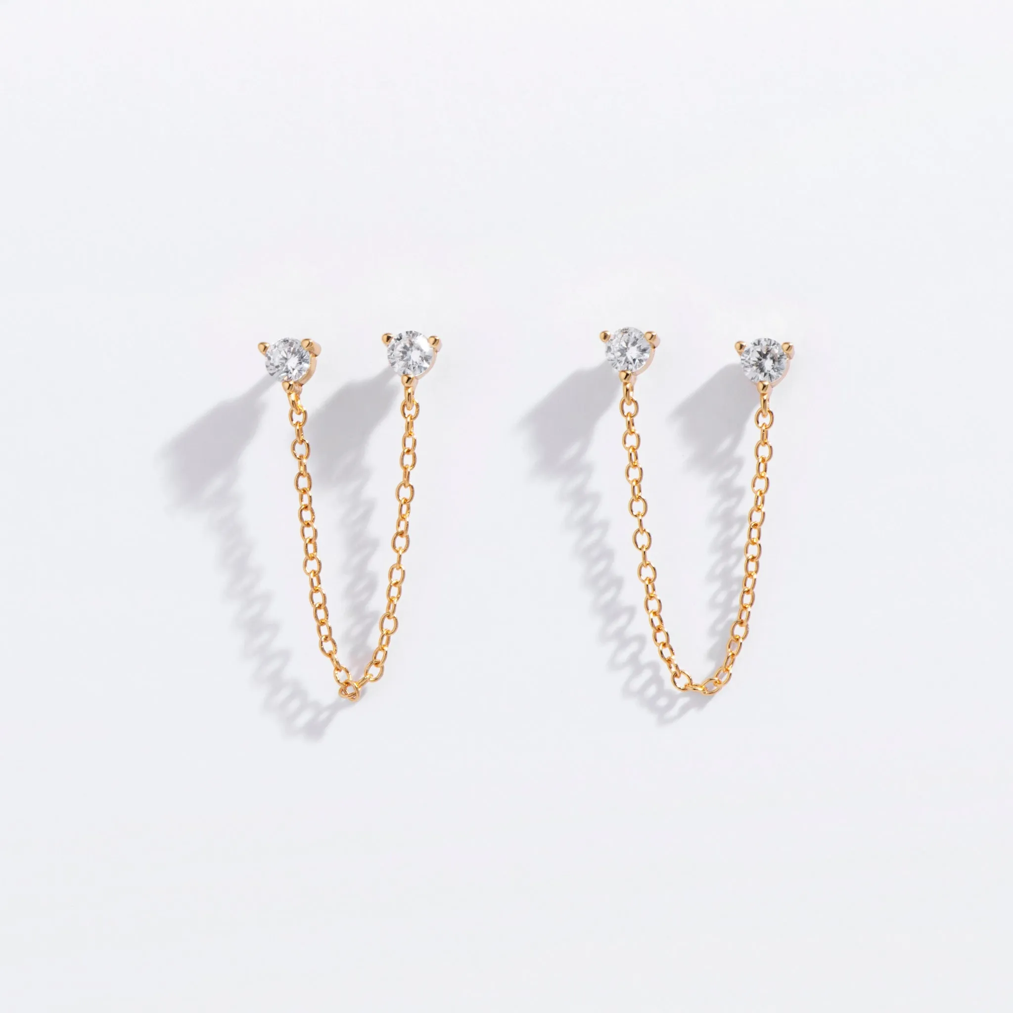 Double CZ Chain Studs sold by Modcloth