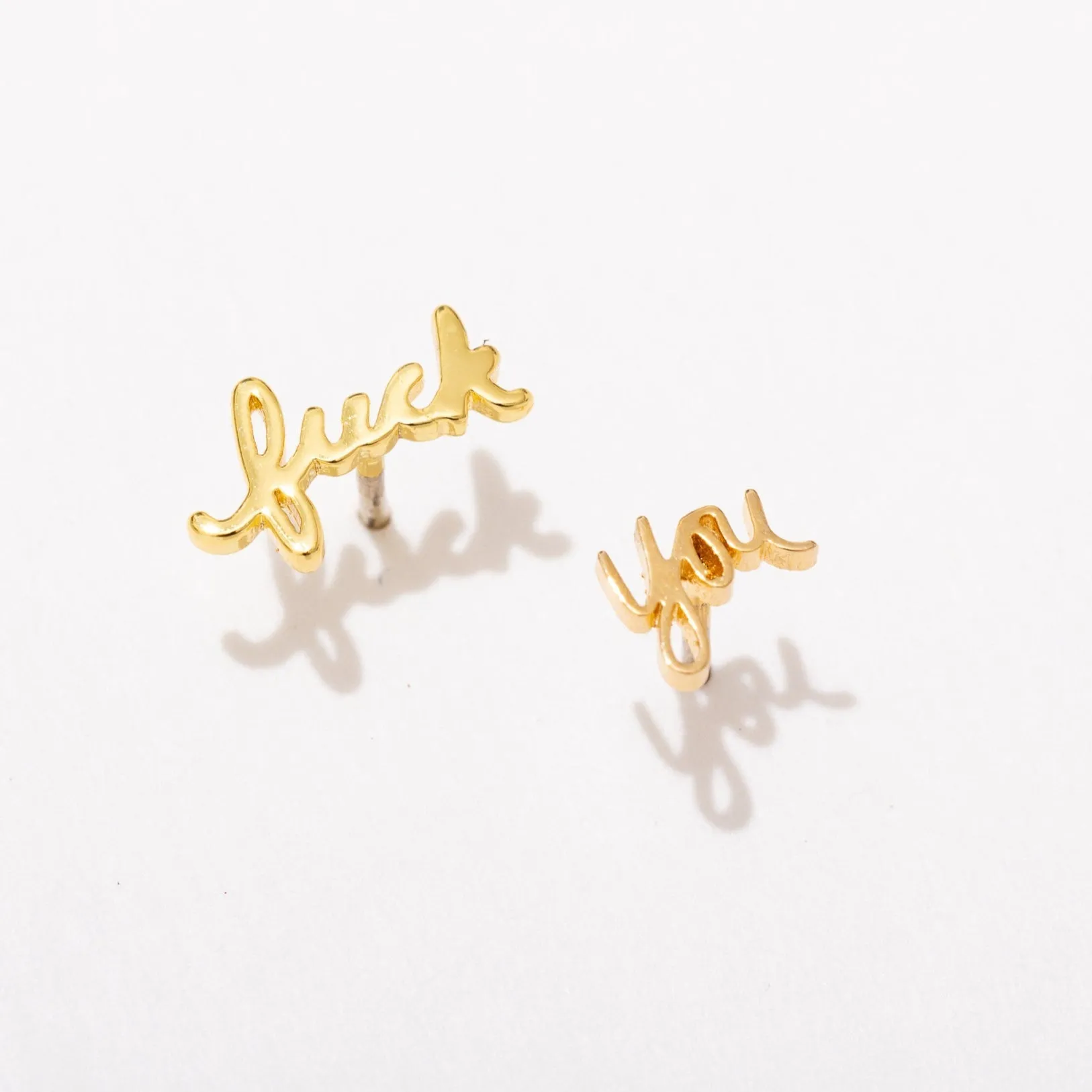 Fuck You Script Stud Earrings sold by Modcloth