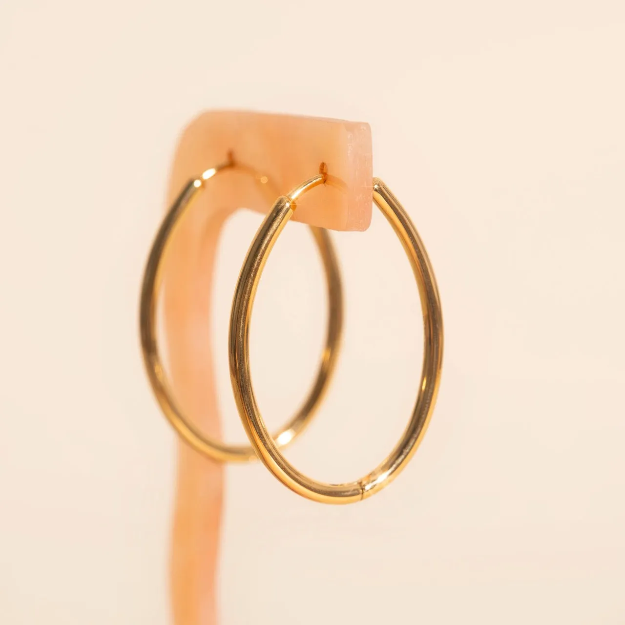 Oval Rounded Huggie Hoop Earrings sold by Modcloth