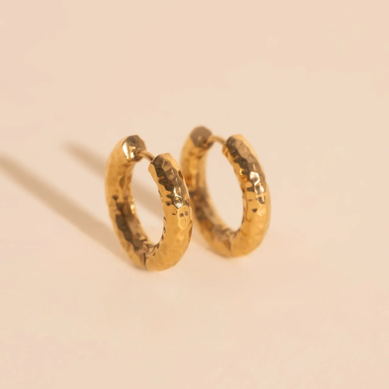 Hammered Chunky Rounded Huggie Hoop Earrings sold by Modcloth