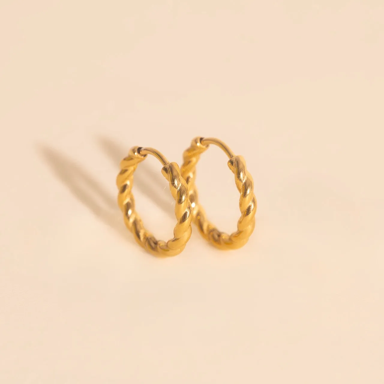 Twisted Rope Rounded Huggie Hoop Earrings sold by Modcloth