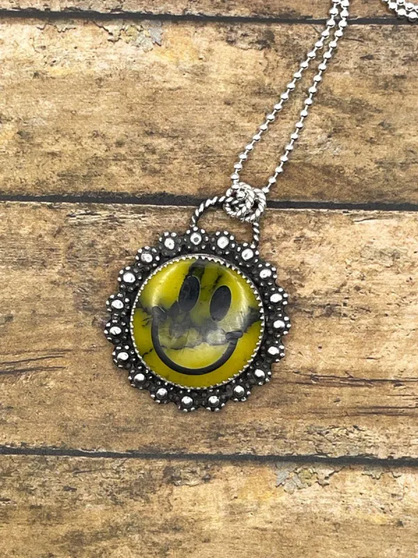 Quin - Smiley Face with Daisy Flowers Pendant Necklace made by Modcloth