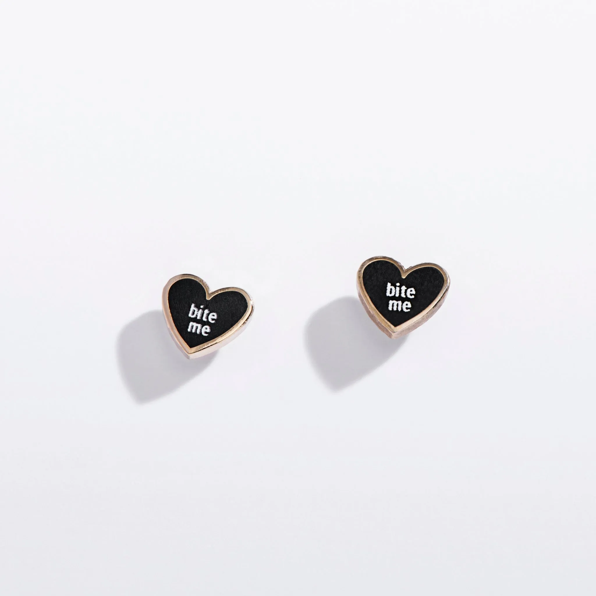 Bite Me Stud Earrings sold by Modcloth
