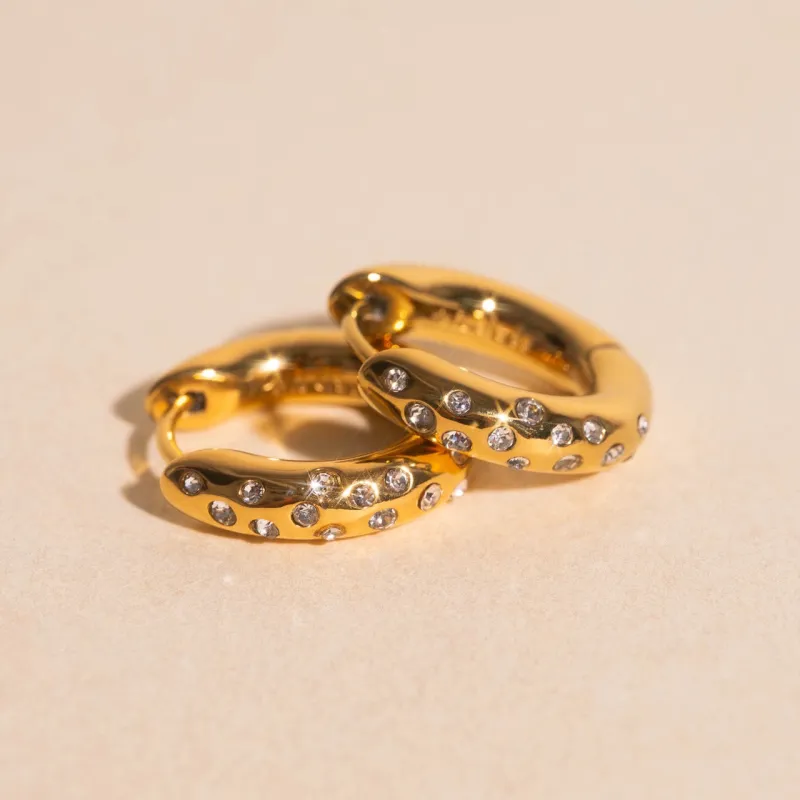 Sparkle Chunky Rounded Huggie Hoop Earrings made by Modcloth