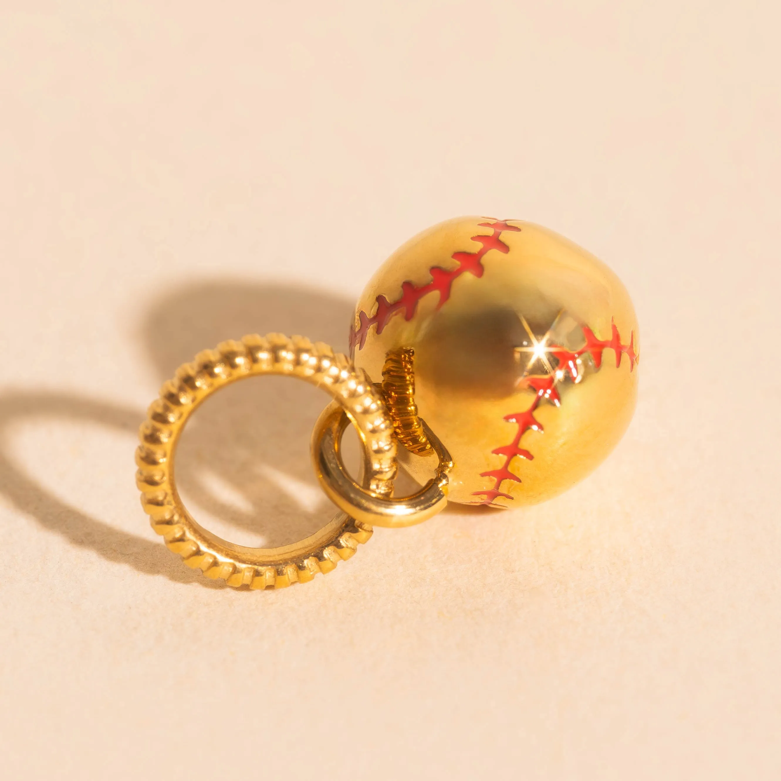 Fastball Necklace Charm sold by Modcloth