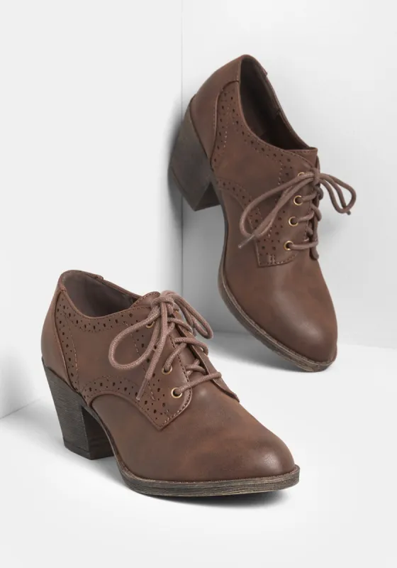 Keep Up With Me Lace-Up Bootie sold by Modcloth