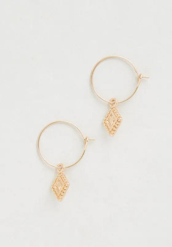 Dangling On Every Word Hoop Earrings sold by Modcloth